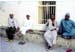 4 amigos outside of mosque - Old Town Zanzibar